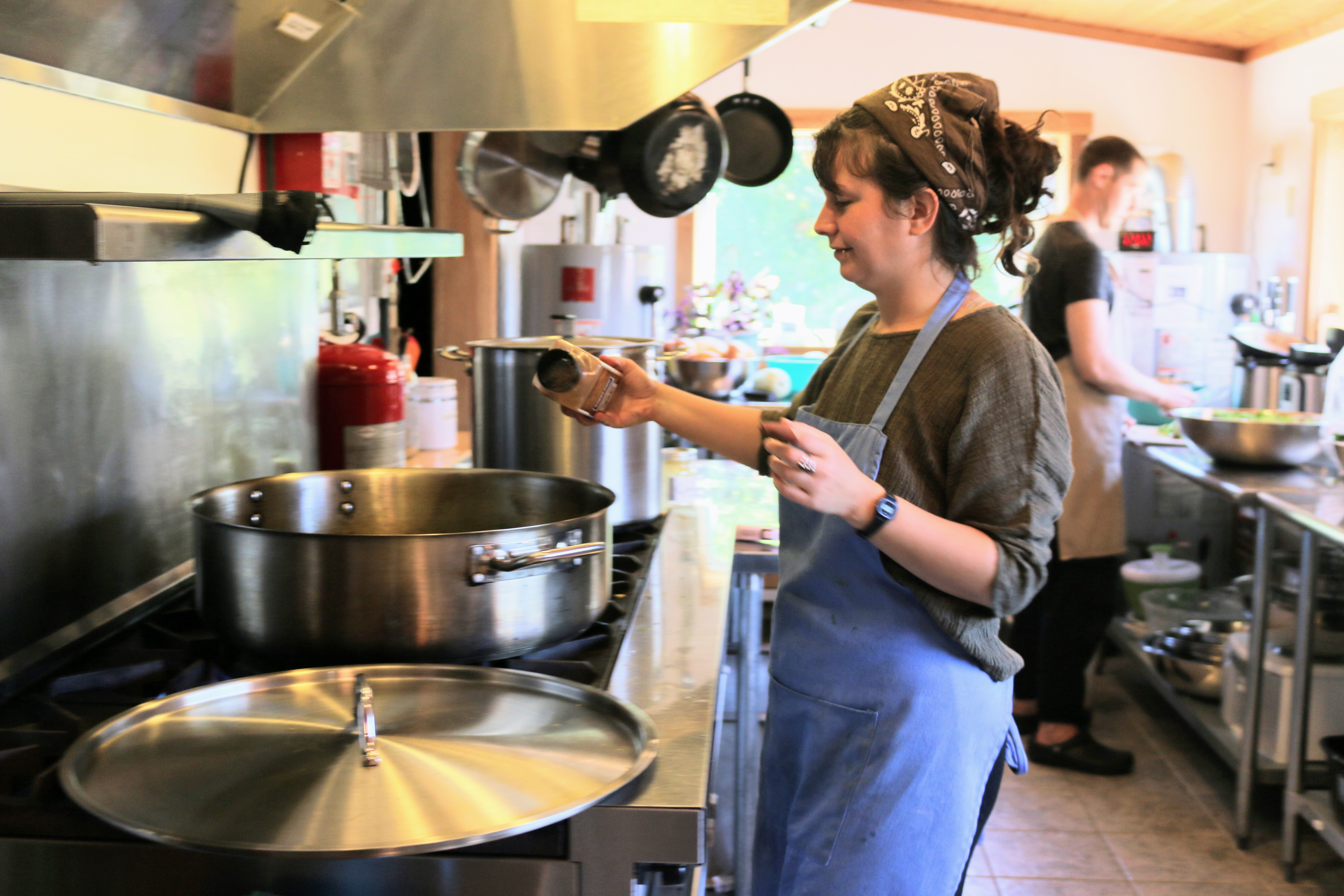 Two residents cooking a meal